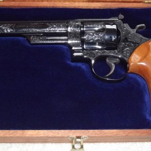 Model 29-2, 6 1/2 inch, with Class A Engraving.  Engraver believed to be Russ Smith.  This revolver is OOTR (open on the records), but believed to hav