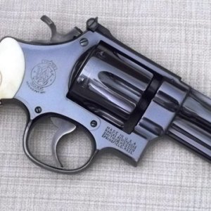 Pre-model 27, five screw, five inch barrel, serial S17342x that shipped from the factory in February of 1958 and wears ivory magna grips.