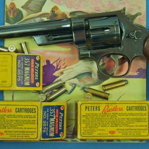 Pre-WW II Non-Reg 357 Mag, SN 621xx, 6 1/2" bl w/ three boxes of Peters 357 Mag Ammo - showing back side of boxes..