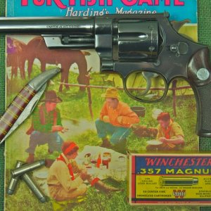 Reg. 357 Mag., Reg No. 4455, 6" bl w/ a "1939" Win. box of .357 ammo.