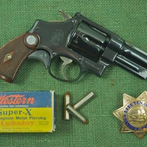 Reg. 357 Mag., Reg No. 2528, 4 1/2' bl w/ a box of Westerm.357 ammo with Metal Piercing Bullets.