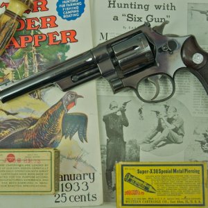 38-44 Outdoorsman SN 425xx w/ of box of  Western  38 Sp. Metal Piercing Bullets and a  box of Rem. 38-44 with Lead bullets - showing back side of boxe
