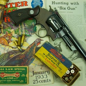 38-44 Outdoorsman SN 425xx w/ of box of  Western  38 Sp. Metal Piercing Bullets and a  box of Rem. 38-44 with Lead bullets.