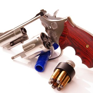 Here's a Model 66-1 .357 snubby, pinned and recessed, with Ahrends finger-grooved concealment stocks.