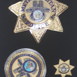 Las Vegas Metropolitan Police badge set in  of
remembrance 9/11. Badge, challenge coin and tie tac/lapel pin. Crafted by Sun Badge CO.