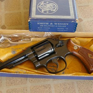 This 4-screw Model 10-2 M&P in .38 special left the factory in May of 1962.  It's still as new in the box, and apparently has never been fired since i